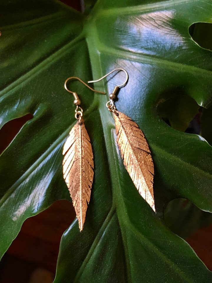 Håndlavede fjerøreringe af genbrugte cykelslanger for engroshandel hos R3recycledgoods