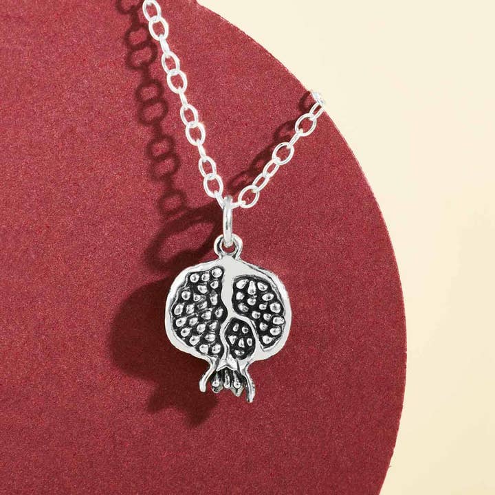 Sterling Silver Pomegranate Necklace and other Purchase Wholesale pomegranate moon. Free Returns & Net 60 Terms on Faire trending on Faire.