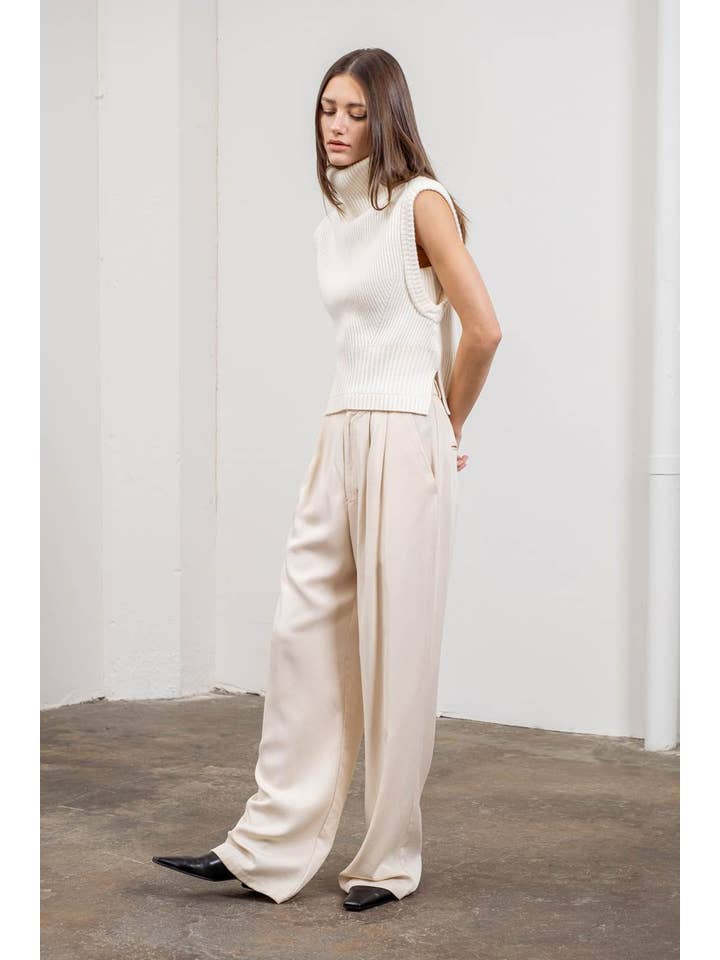 IVORY SLEEVELESS TURTLENECK PULLOVER SWEATER for wholesale on Faire