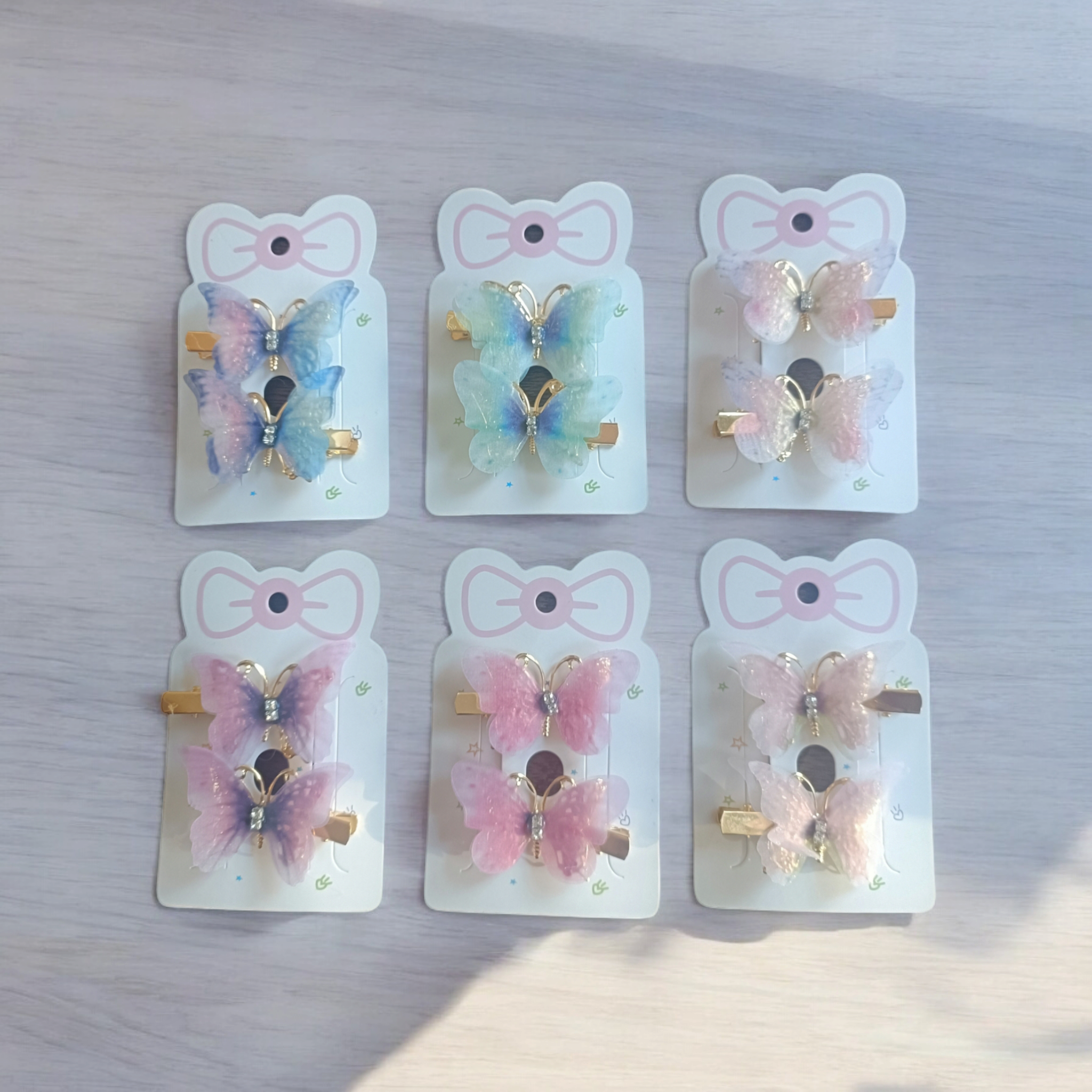 Kids4trendy – wholesale Hårklämma - Barn – Set med fjärilsglitter hårspännen1