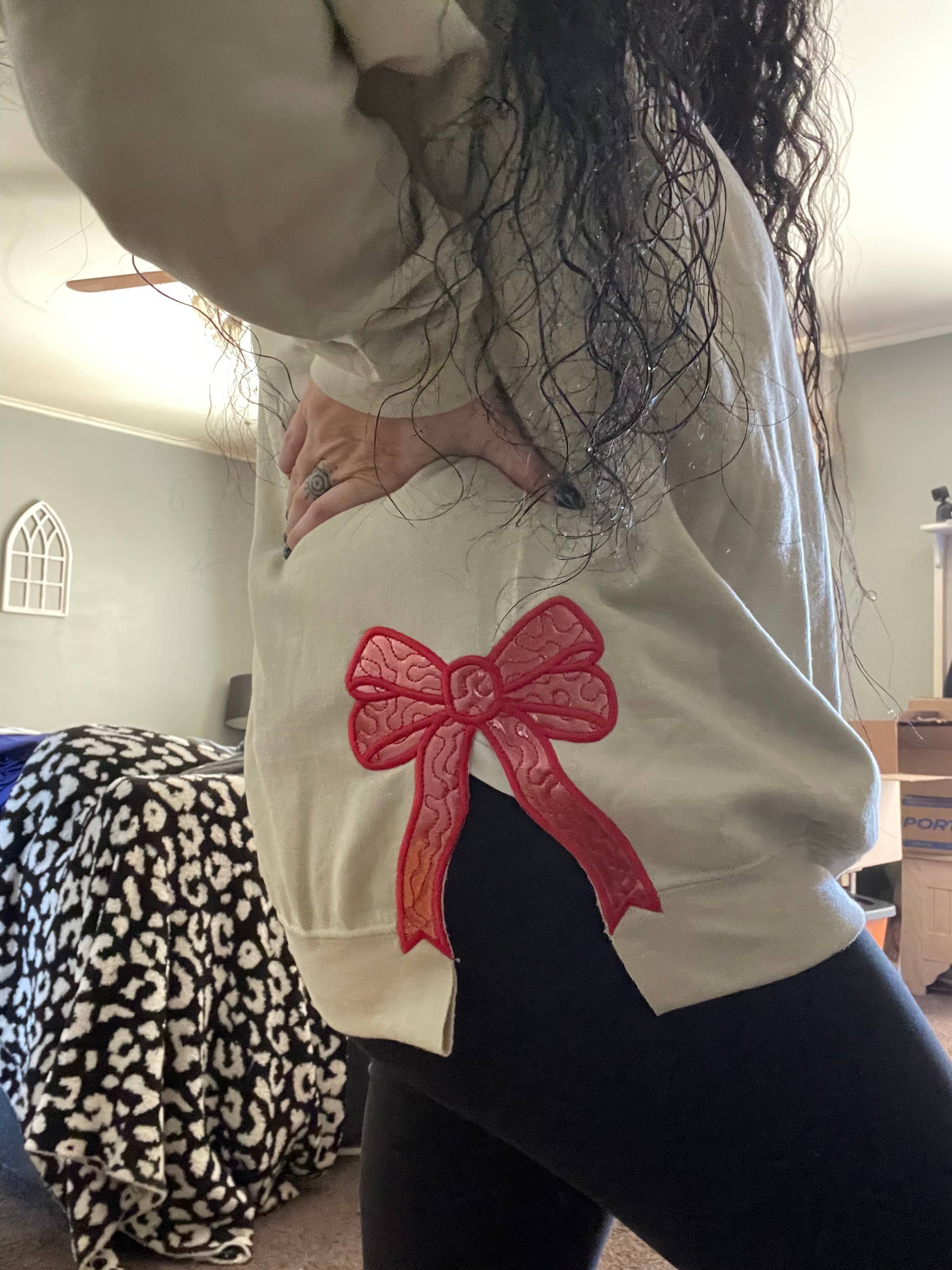 Basil & Burch - Wholesale Sweatshirt - Women's - Side bow cut out embroidered crewneck. 1