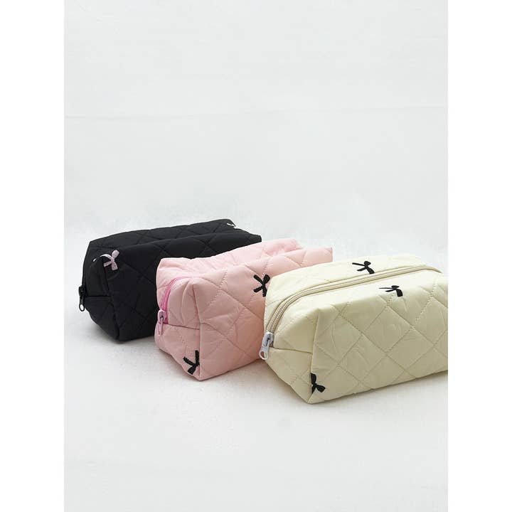 Embossed Cloth with Bow Embroidery Cosmetic Bag for wholesale by Love and Repeat