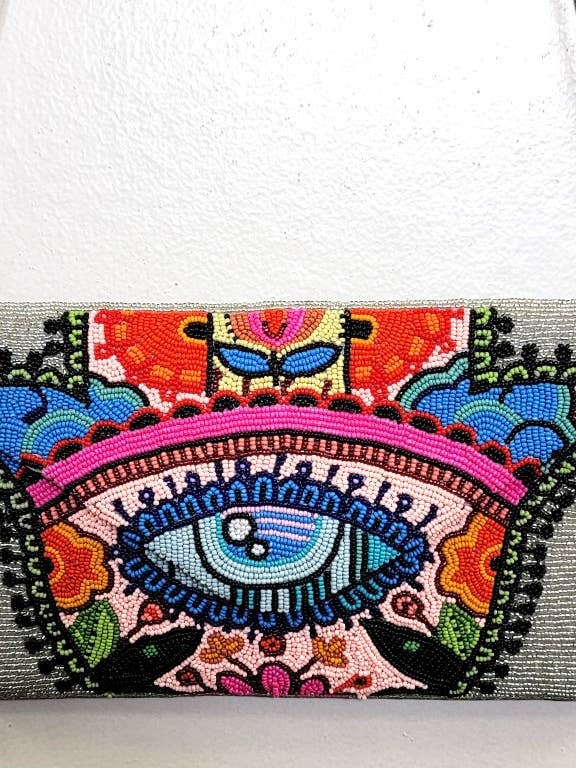 EMBOLSADEIRA DE MÃO COM MISSANGAS HAMSA por atacado de Ricki designs