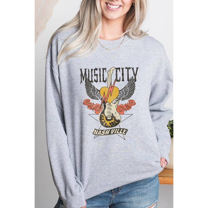 VINTAGE SWEATSHIRTS MET GRAFISCHE PRINT UIT NASHVILLE voor wholesale door Illustrated Society