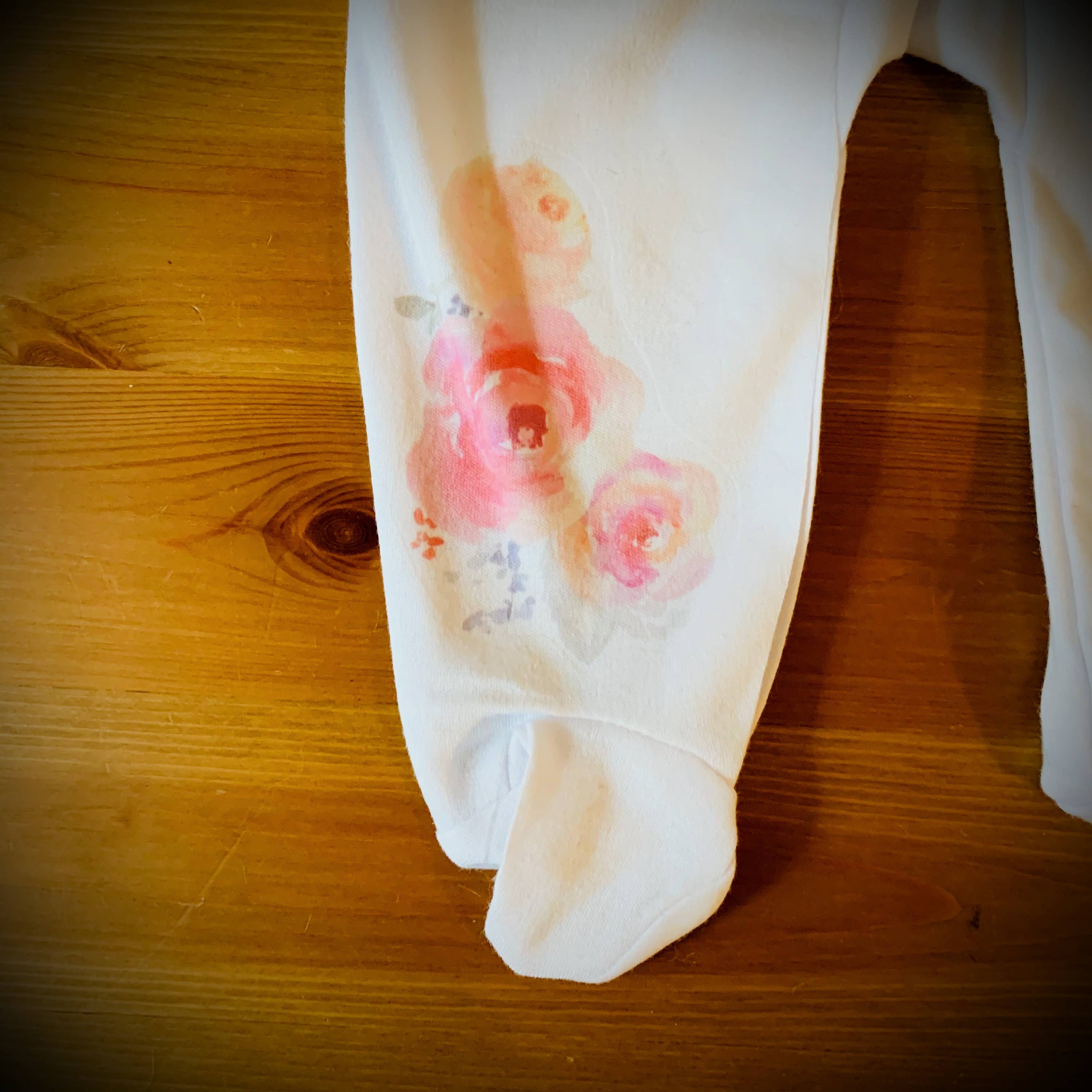 Cloud White Baby Footed Romper - Watercolor Flowers for wholesale on Faire4