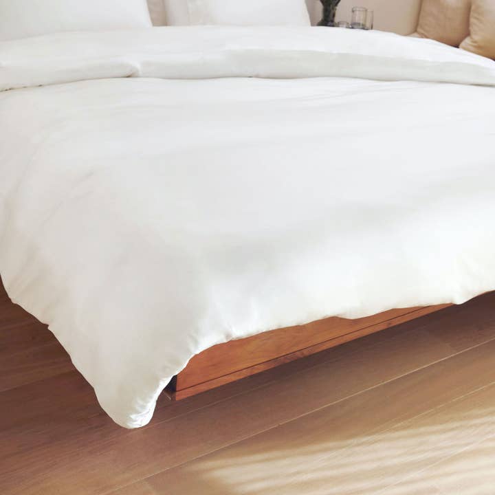Tranquil White Washable Silk Duvet Cover for wholesale on Faire