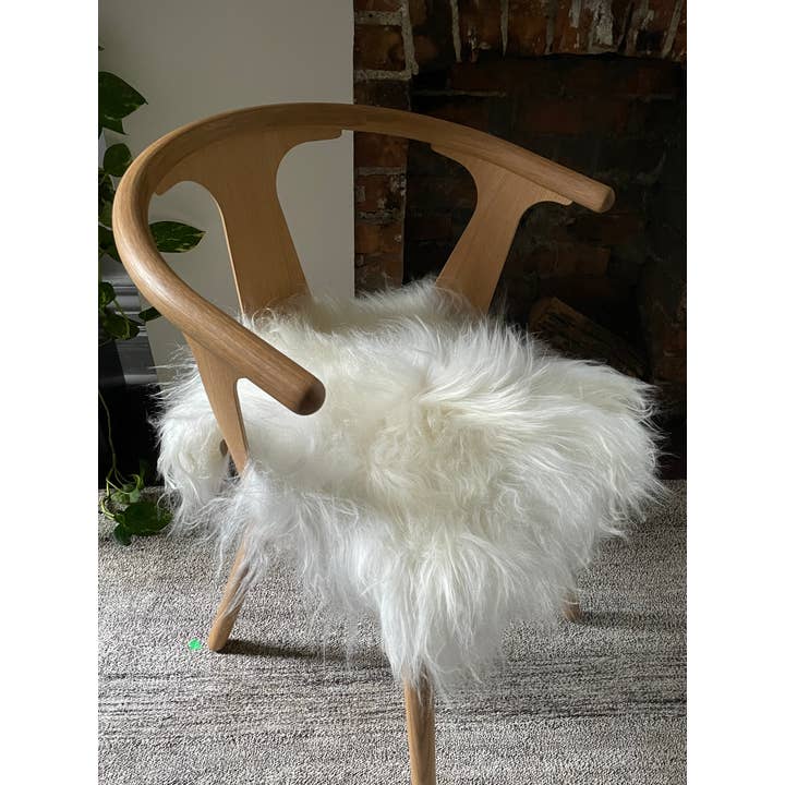 Black Sheep (White Light) - Wholesale Chair Cushion - White Icelandic Sheepskin Chair Pad1