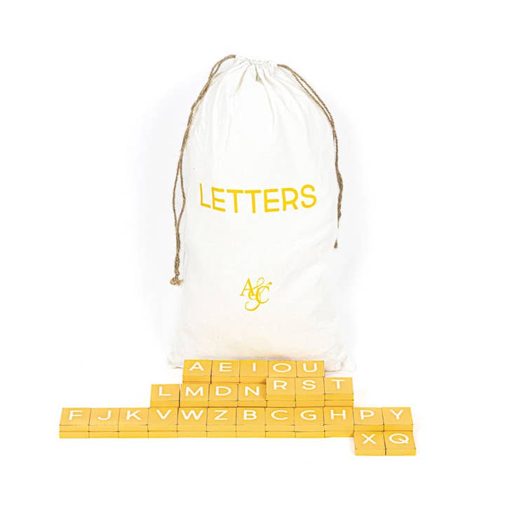 15723 - bag 70 pc set wood letters (MUSTARD) LETTERBOARD for wholesale by Devanie At Home (Formerly Adams & Co.)