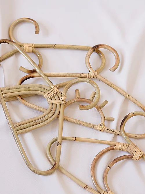 Tan Rainbow Bamboo Kids Hanger for wholesale on Faire1