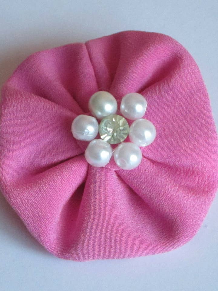 Hot Pink Corsage With Faux Pearl And Diamante Centre for wholesale by Style Showroom