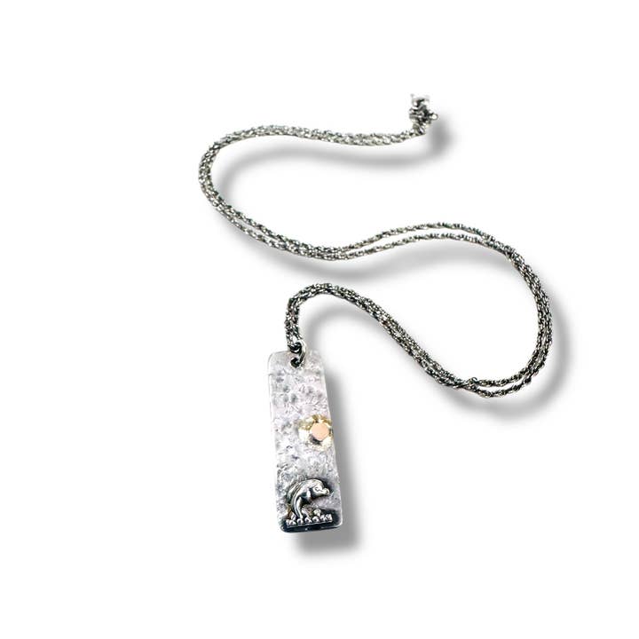 Dolphin Under the Sun Silver Necklace for wholesale by Janine’s Jewelry Design