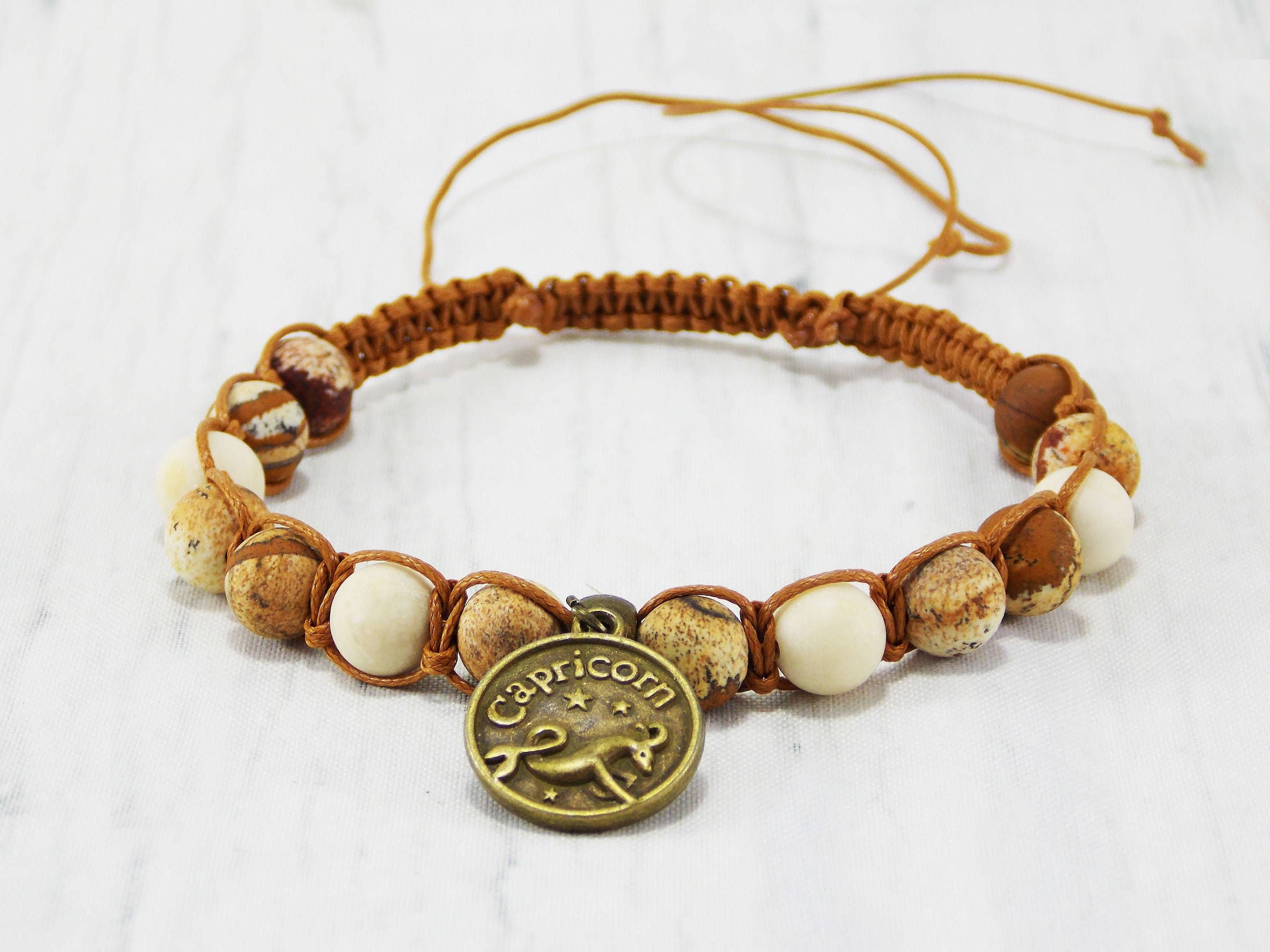 Ninolia - Venta al por mayor Pulseras de abalorios/colgantes - Pulsera Capricornio con dije de signo del zodíaco de cabra de 8 pulgadas de largo, piedra preciosa unakita macramé, regalos de cumpleaños de enero0