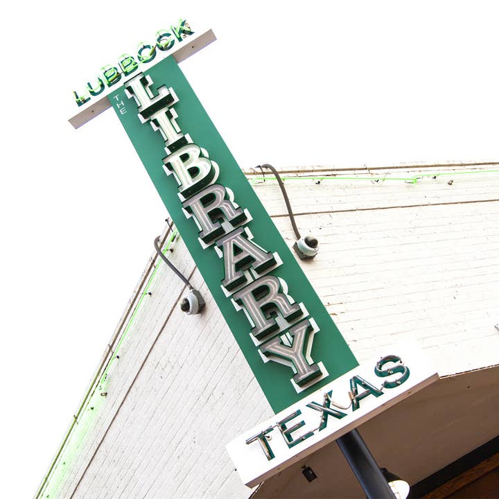 The Library Bar Sign for wholesale by South Austin Gallery