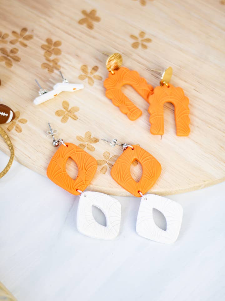 Deco collectie oranje en wit voor wholesale door EJ Clay Co