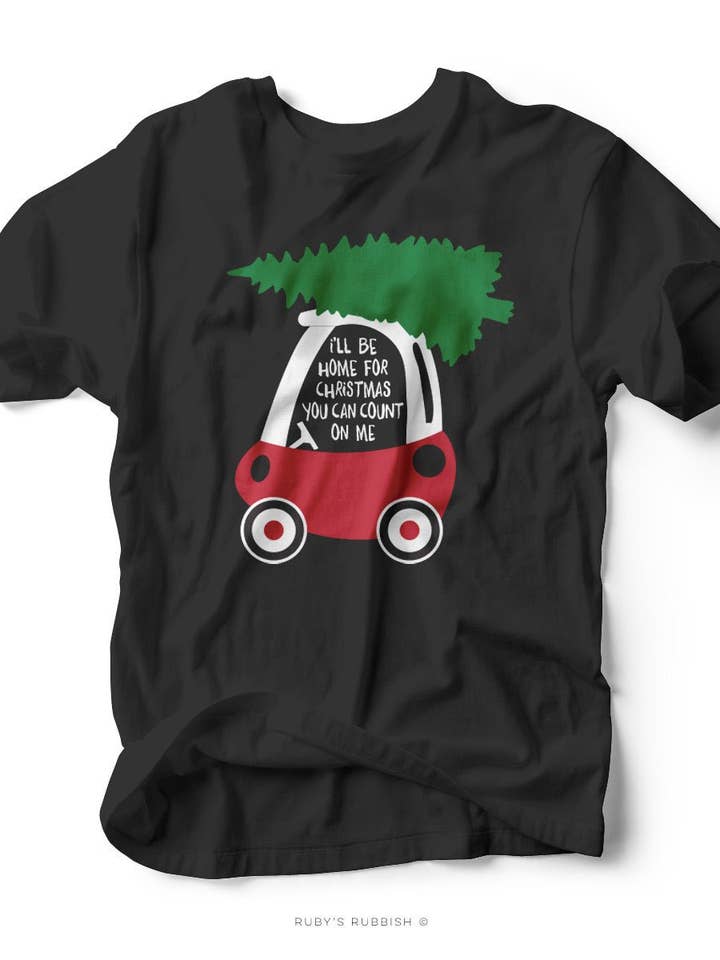 Je serai à la maison pour Noël | T-shirt pour enfants | Ruby’s Rubbish® pour la vente par Ruby’s Rubbish