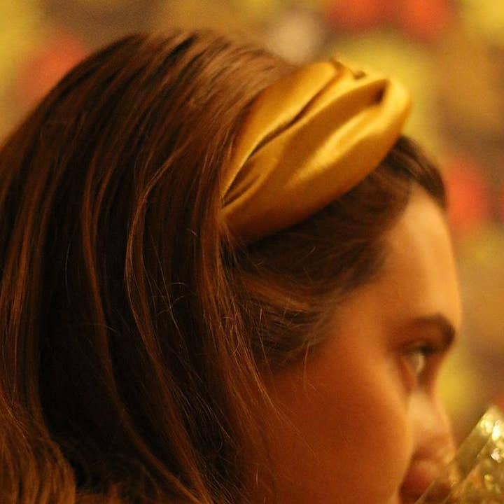 Gold braided headband for wholesale by Eunoia Paris