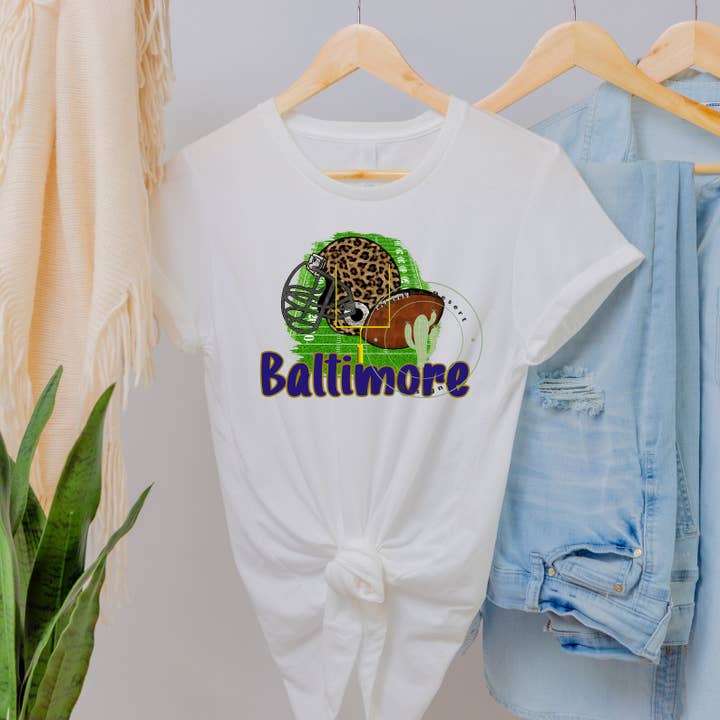 Baltimore Leopard Helmet Unisex T-shirt - Ravens for wholesale by Into The Desert