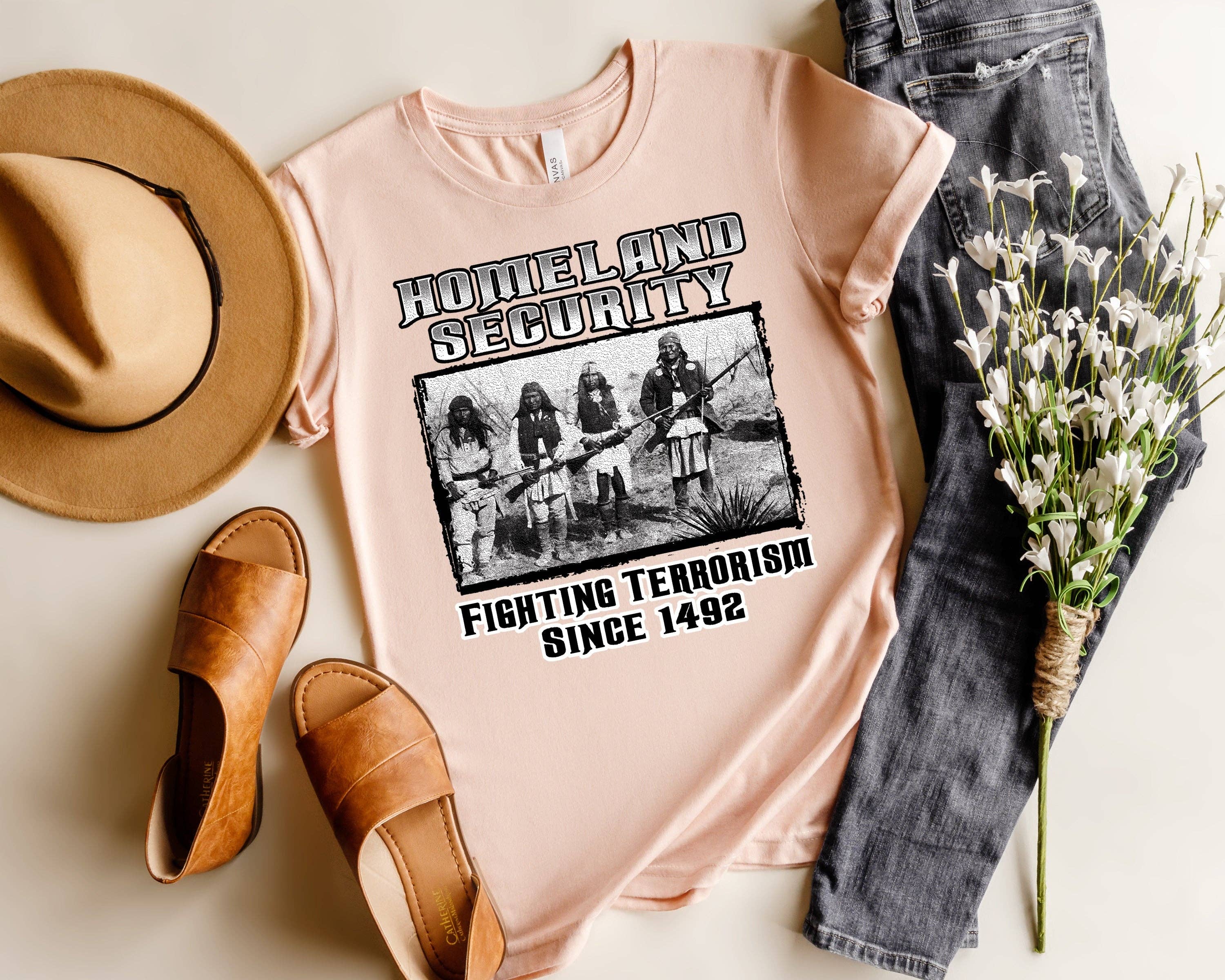 Artopia - Wholesale T-Shirt (Graphic) - Women's - Native American T-Shirt, Homeland Security Since 1492 Tee3