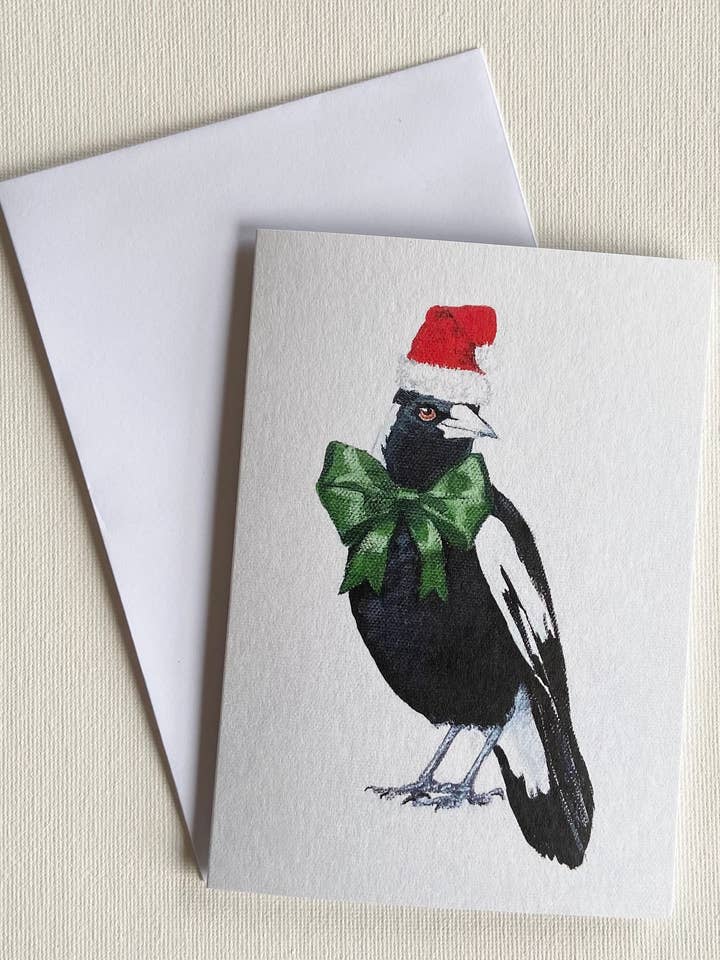 Christmas Magpie with Green Bow Greeting Card for wholesale by Lucinda Cotter Art