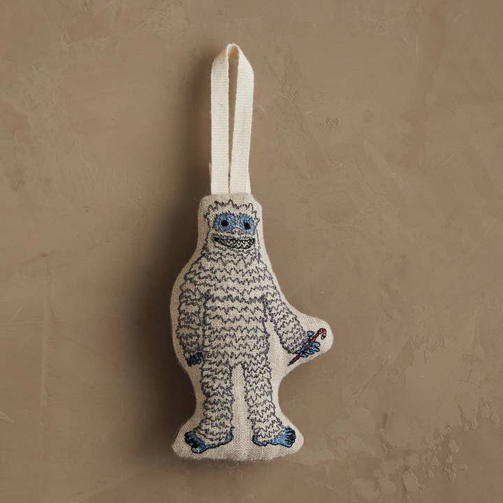 Decorazione Yeti con bastoncino di zucchero per la vendita all'ingrosso da parte di Coral & Tusk