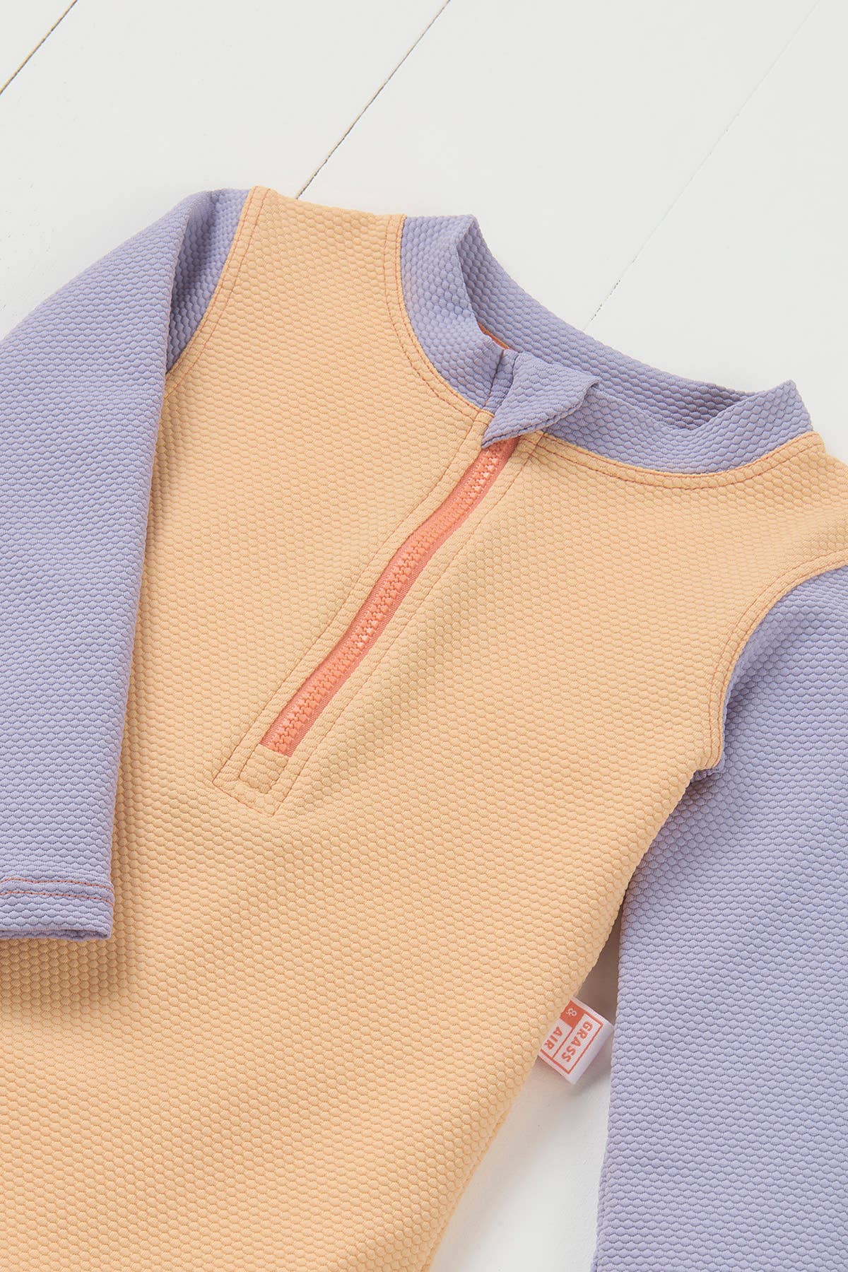 Peach Ribbed Kids Long Sleeve Swimsuit for wholesale on Faire1