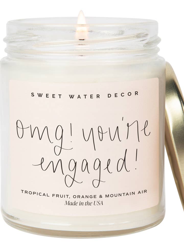 OMG! You're Engaged! 9 oz Soy Candle - Home Decor & Gifts and other Purchase Wholesale i do. Free Returns & Net 60 Terms on Faire trending on Faire.