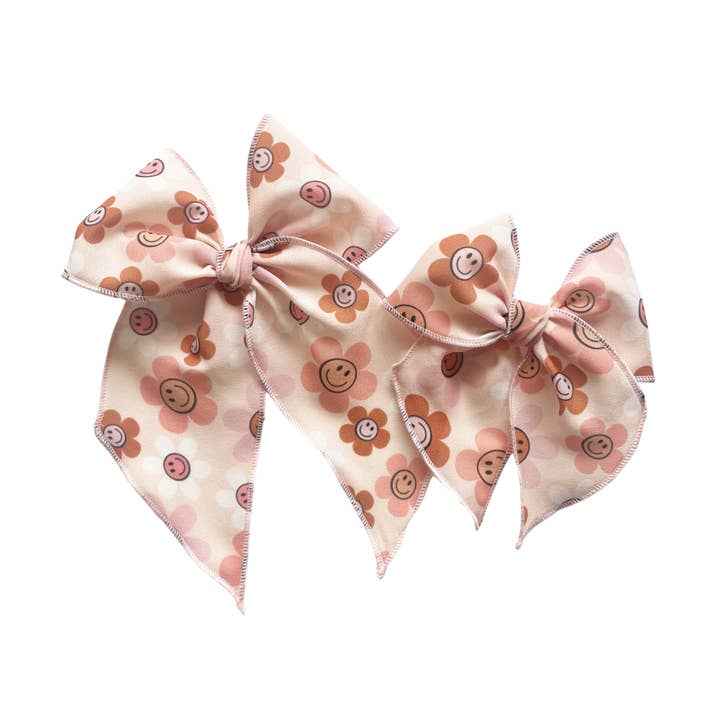 Muted Smile Daisy Elle Bow for wholesale by Lady Eleanor & Co