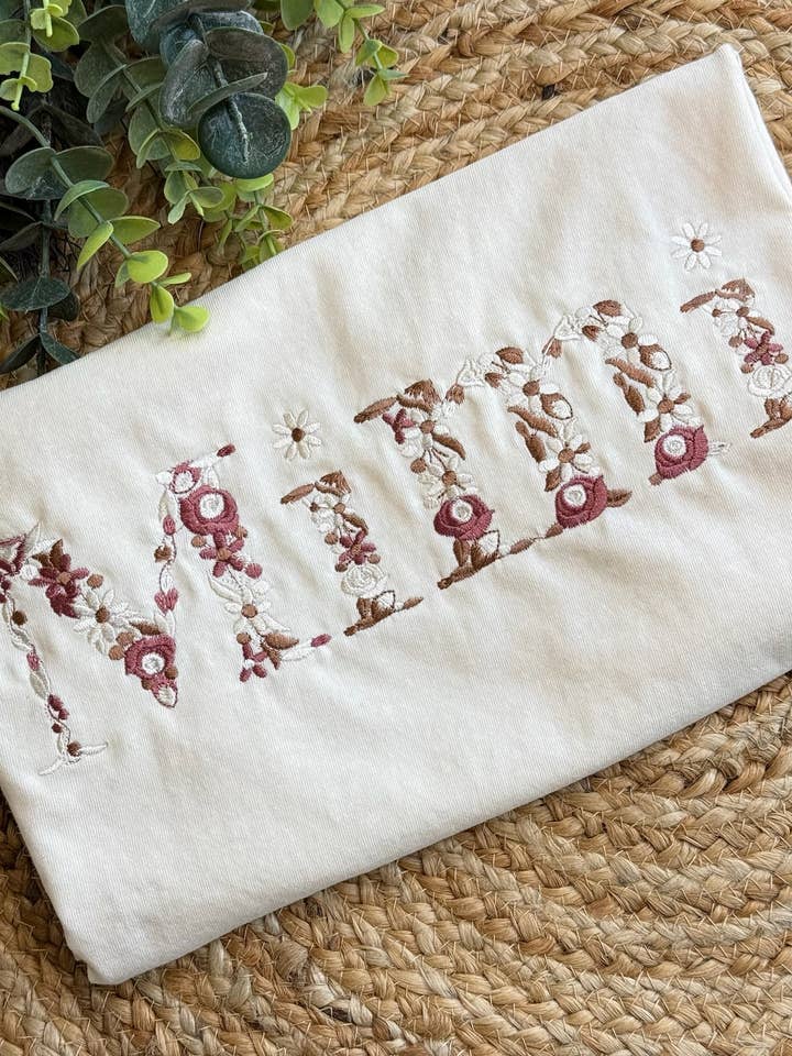 Neutral Floral Mimi Embroidered Comfort Color Tee for wholesale by Lakely Claire Wholesale