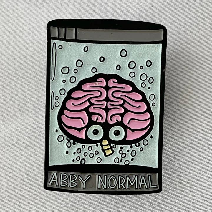 ABBY NORMAL Brain 1.75” Glow Soft Enamel Pin Horror for wholesale by The Black Lagoon Room