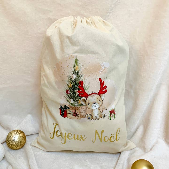 Julkorg med söt lejonunge och texten "Merry Christmas" för wholesale av Jolie bibi & son mini