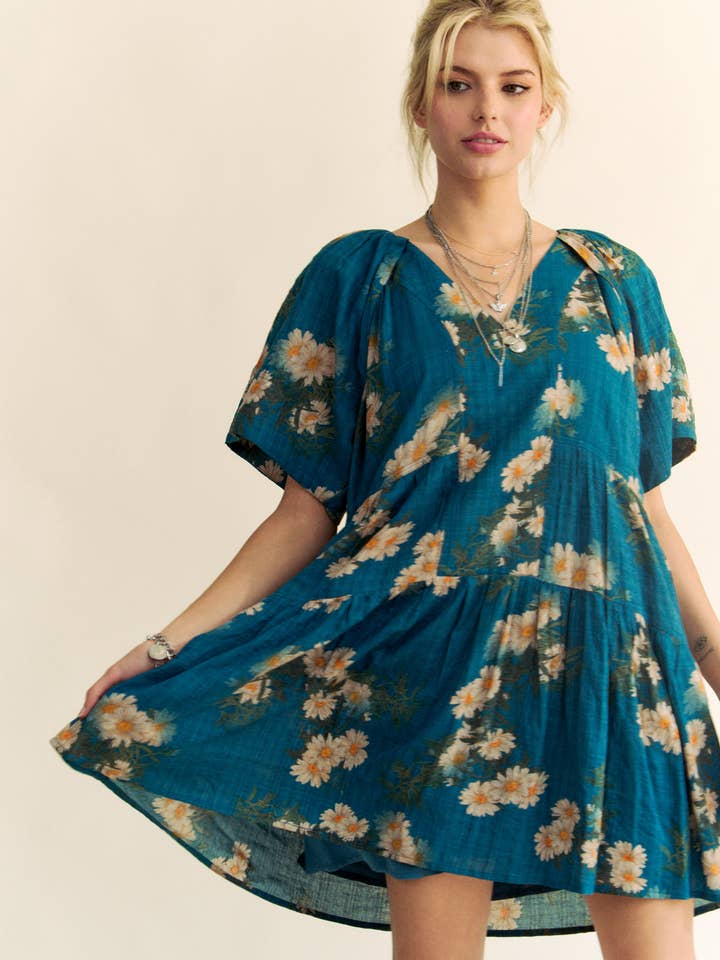 Teal Blue FLORAL PRINT SHORT BELL SLEEVE PLEATED MINI DRESS for wholesale on Faire