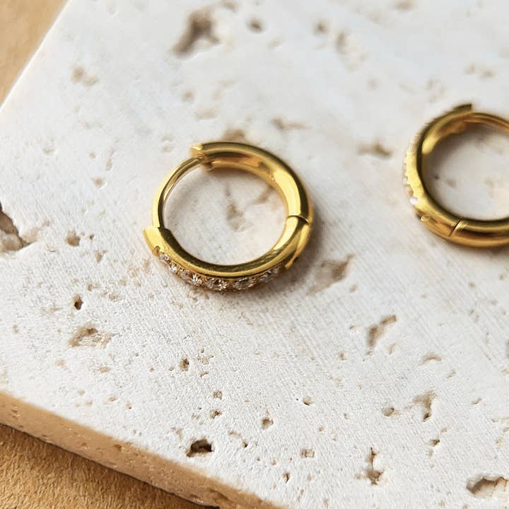 Revelari - Wholesale Huggie Earrings - 18K Gold Stainless Steel CZ Mini Huggie Hoop Earring3