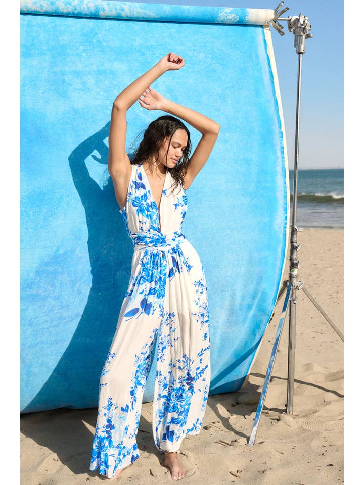 Off White Blue Plunging Neck Floral Woven Jumpsuit for wholesale on Faire1