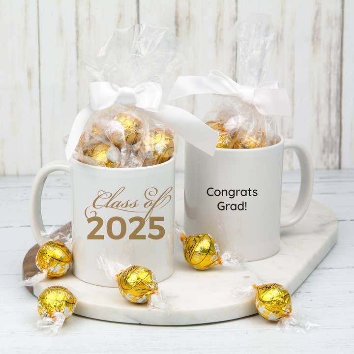 Graduation Mug Filled with White Chocolate Gold Lindor Truffles - Class of Gold for wholesale by Just Candy