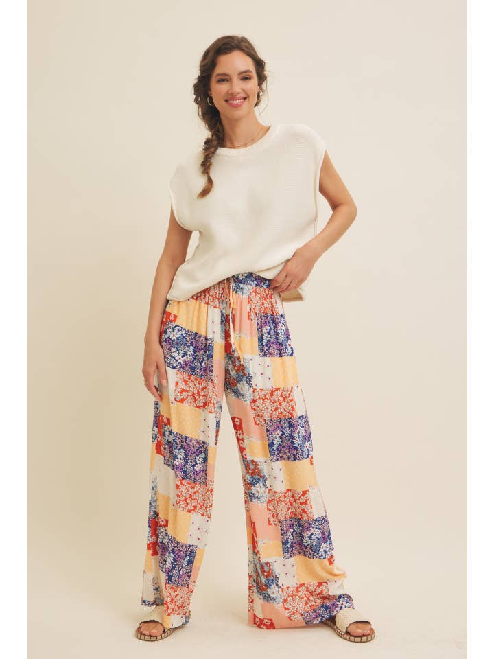 DENIM MULTI SOFT RAYON GAUZE FLORAL PATCHWORK WIDE LEG PANTS WITH POCKET for wholesale on Faire