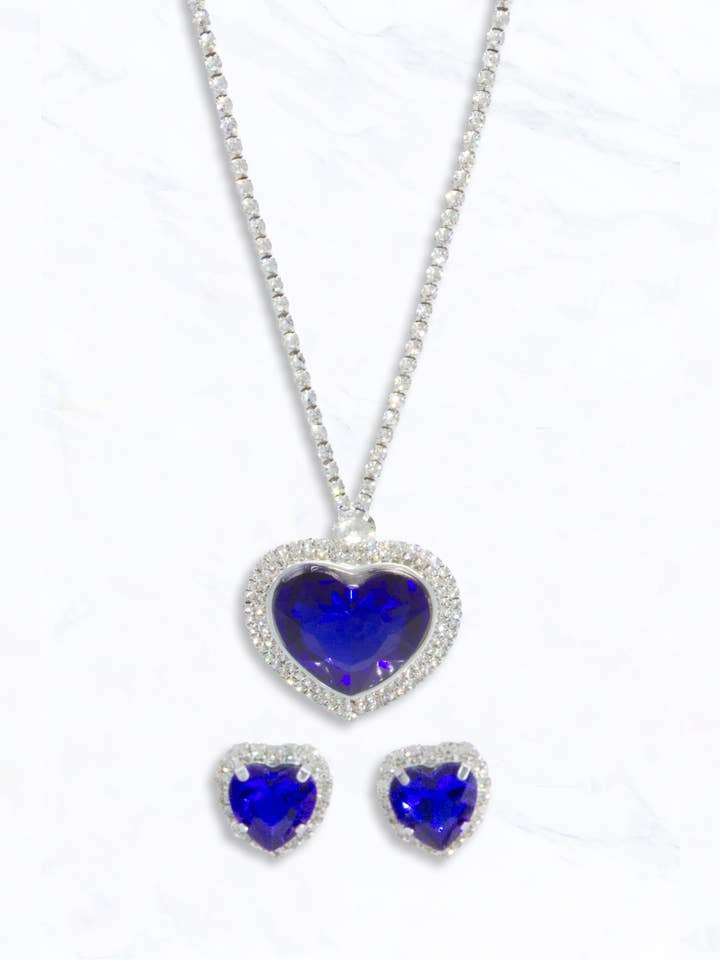 Ensemble collier et clous en cristal cœur bleu pour la vente par Suzie Q USA