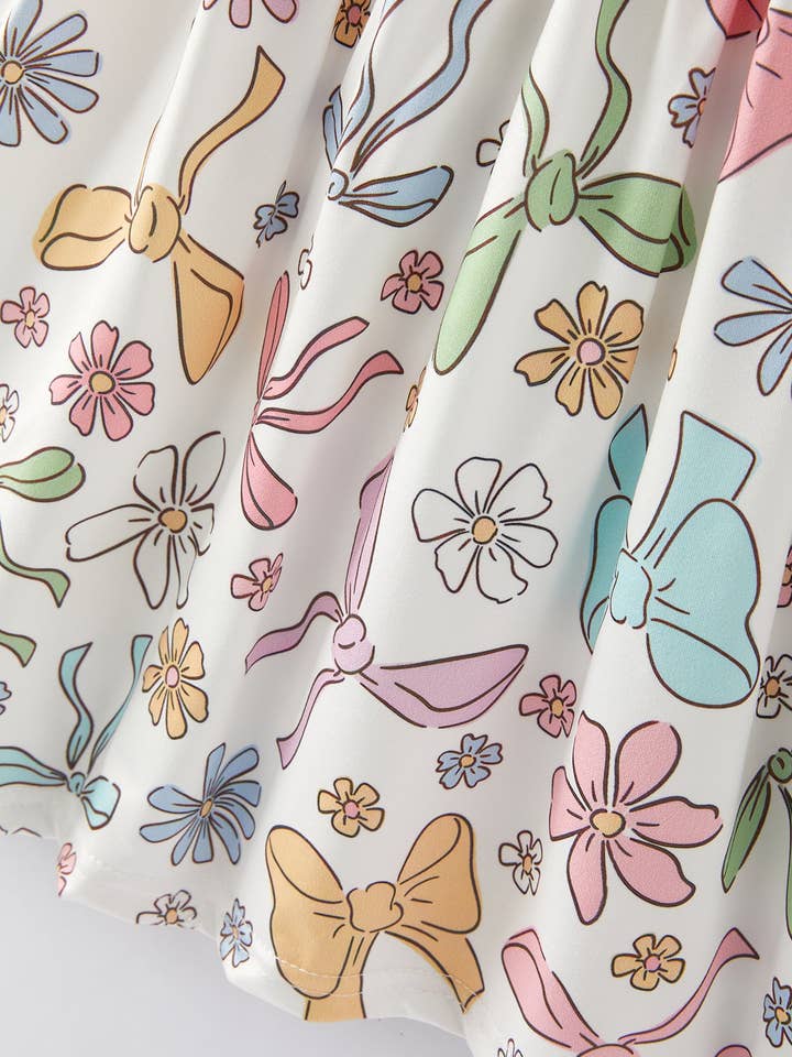 Rylee Faith Designs - Vente Robe – enfant - Robe fille à manches volantes avec imprimé floral de Pâques4