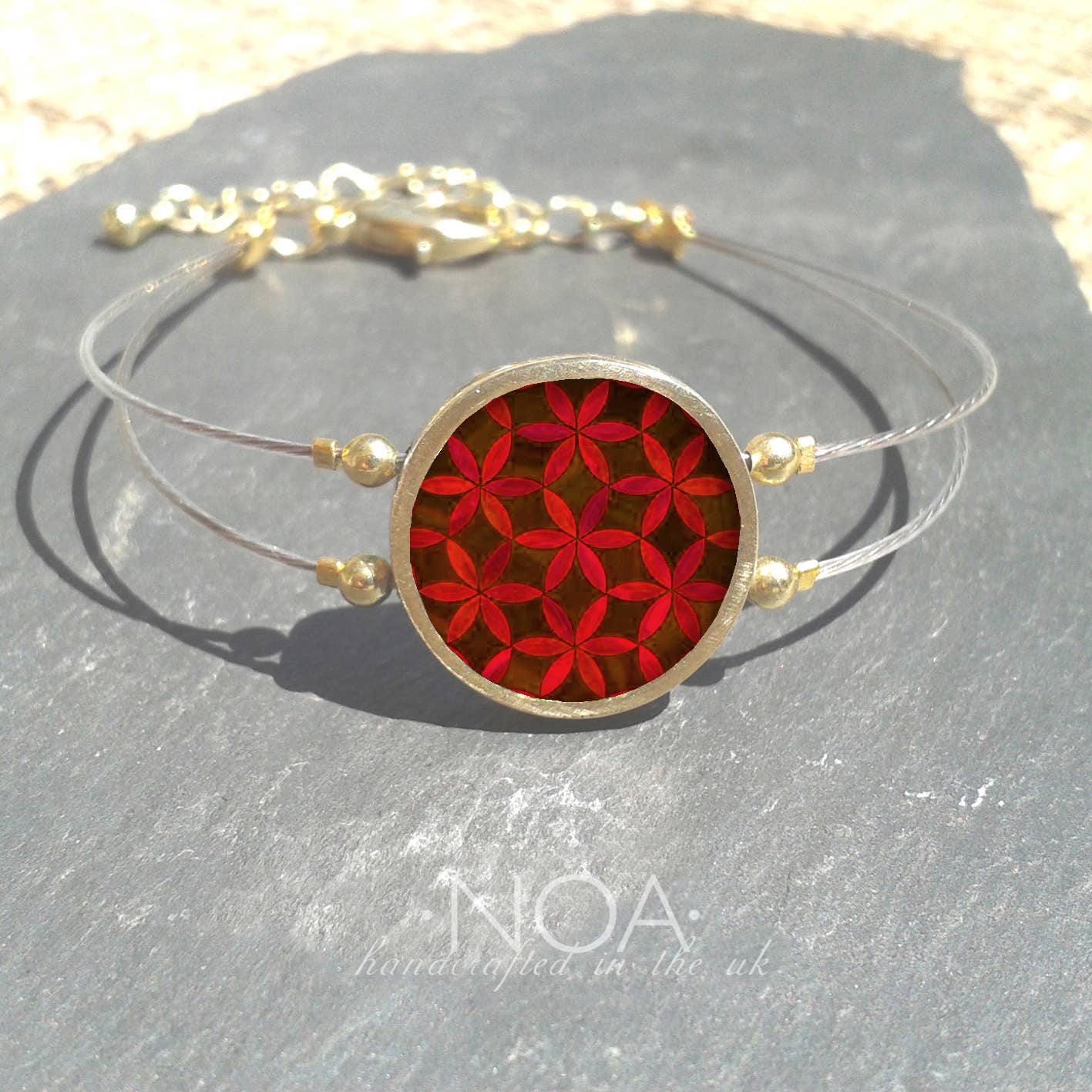 Noa Jewellery – wholesale Charm/dangle bracelet – Round Ceramic Bracelet, Gold Plated Stainless Steel Frame13