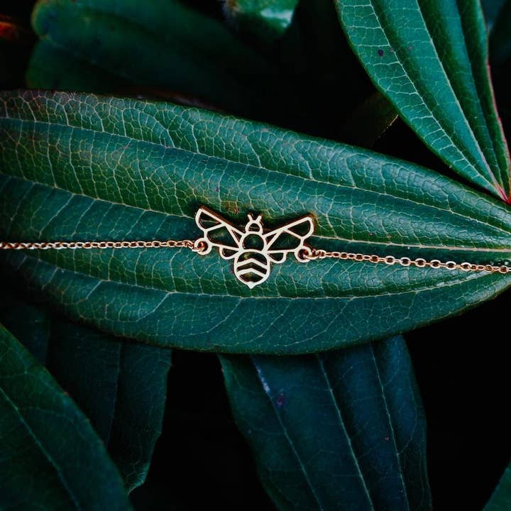 Guld bi armbånd med kæde for engroshandel hos Mountplane