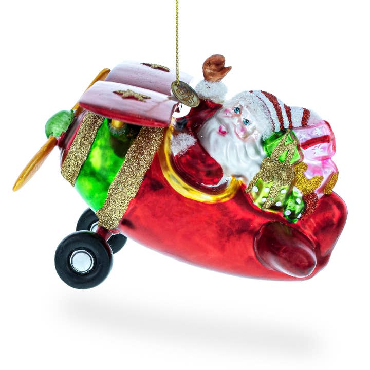 Santa Flying Airplane with Gifts Glass Ornament for wholesale by BestPysanky