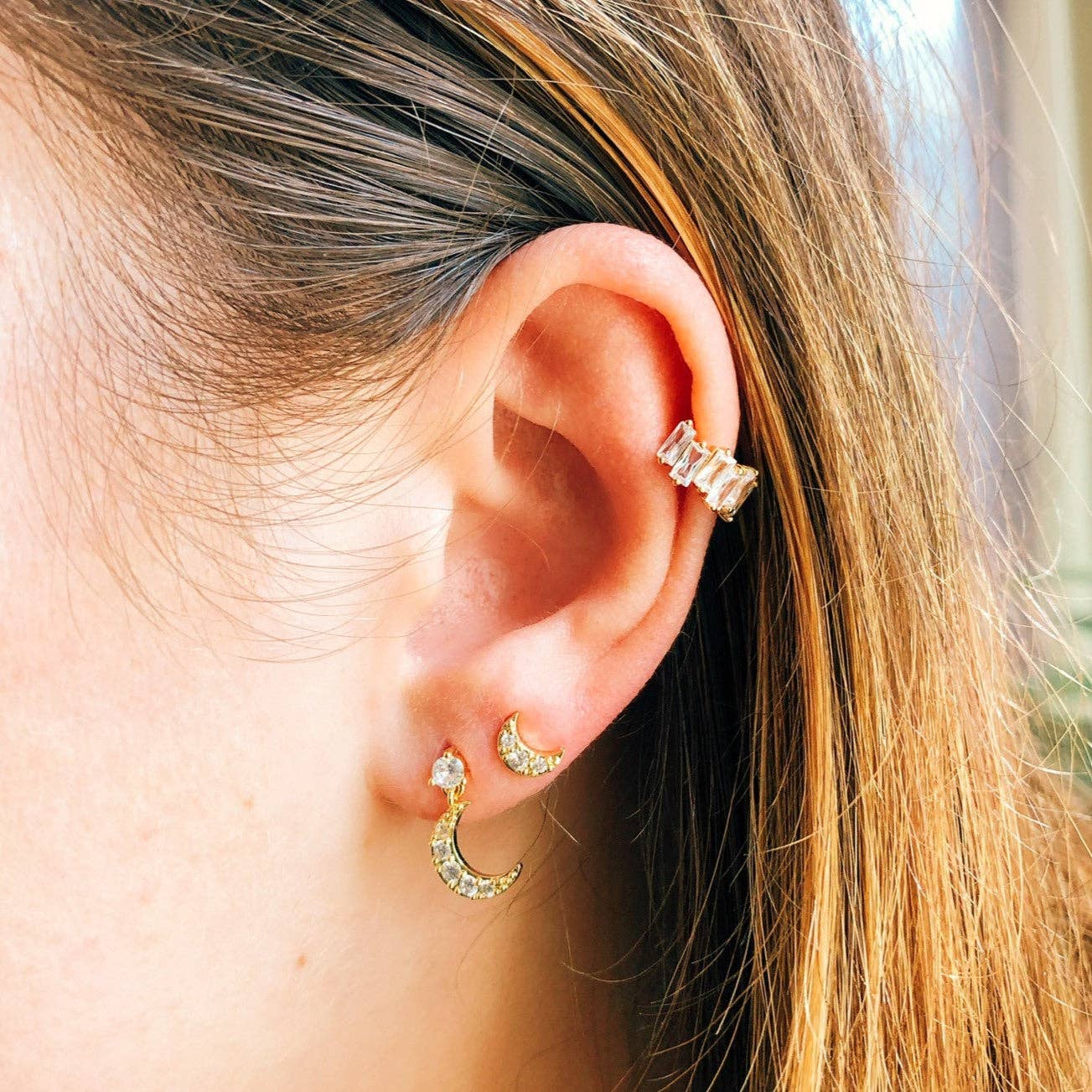 Gold Shining moon studs for wholesale on Faire1