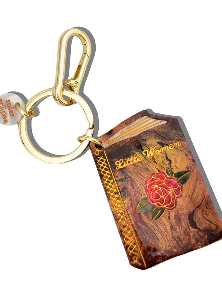 Porte-clés + Charme de Sac Livre Les Quatre Filles du Docteur March Peint à la Main pour la vente par Solar Eclipse