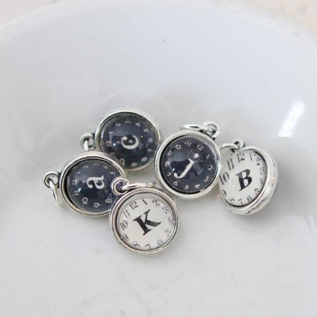 Tiny Two Sided Clock Initial Charm for wholesale by Jennifer Dahl Designs LLC