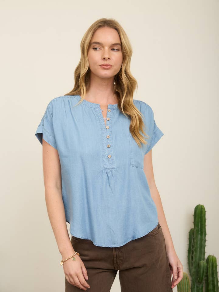 CHAMBRAY HENLEY RUCHED SHOULDER SHORT SLEEVE TOP for wholesale by Blu Pepper