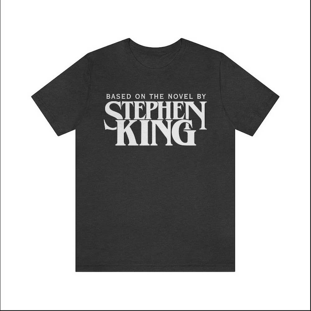 Black Stephen King T-Shirt,Based On A Novel By Stephen King Shirt, for wholesale on Faire