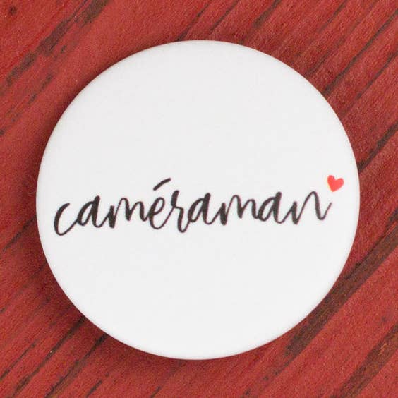 Cameraman wedding badge for wholesale by Te Whaka