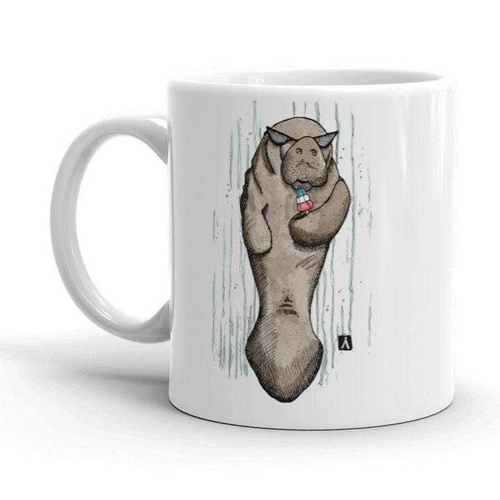 Coffee Mug With Manatee Holding a Popsicle Rocket Pop for wholesale by Bellavance Ink