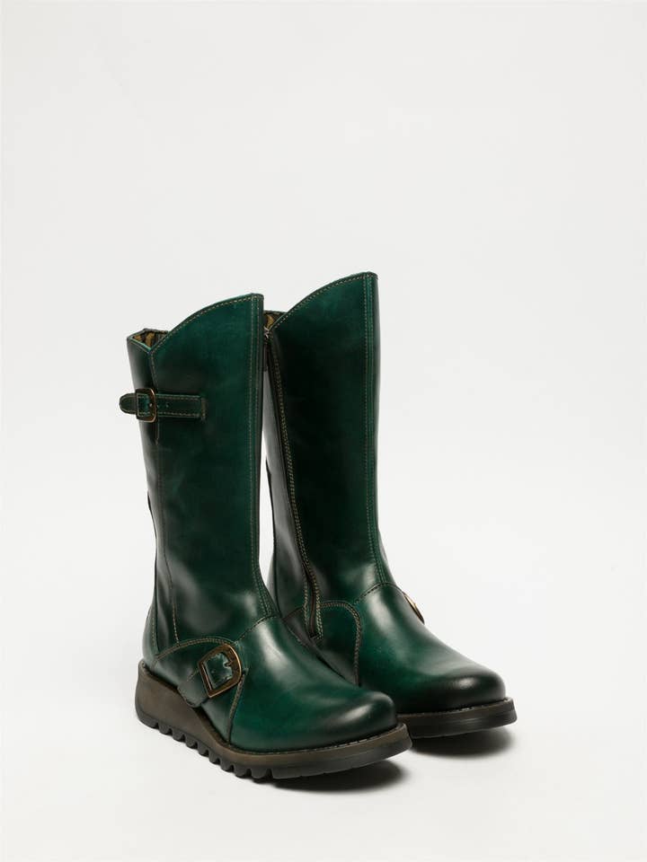 Gasolina Botas de plataforma con cremallera de cuero, tacón de cuña y hebilla para mujer Fly London MES 2 verde hasta media pantorrilla. de venta al por mayor en Faire2