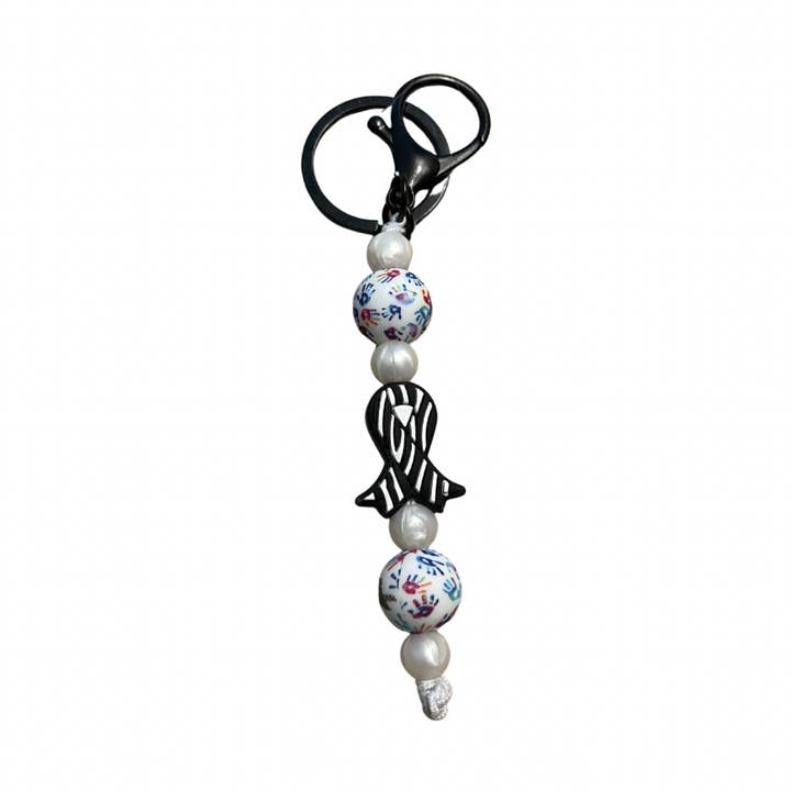 Zebra Ribbon Chronic Illness Awareness Fidget Keychain for wholesale by Shop Simply Fidgets
