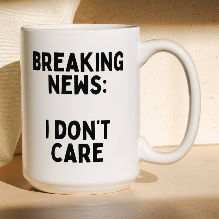 Breaking News. I Don't Care | Mug for wholesale by Wisdom and Wonder Designs